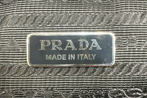 Prada Triangle Logo Zip Chain Crossbody Bag Embossed Leather Small